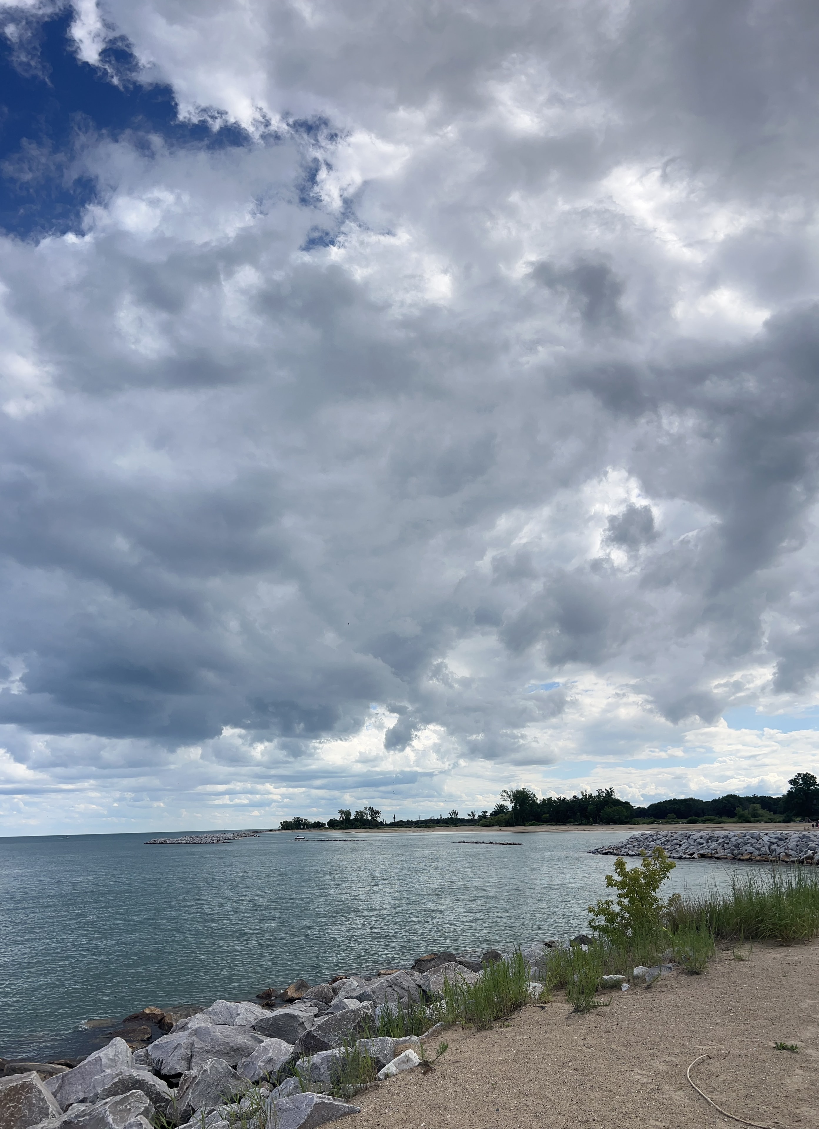 Winthrop Harbor beach with dramatic cloudy sky